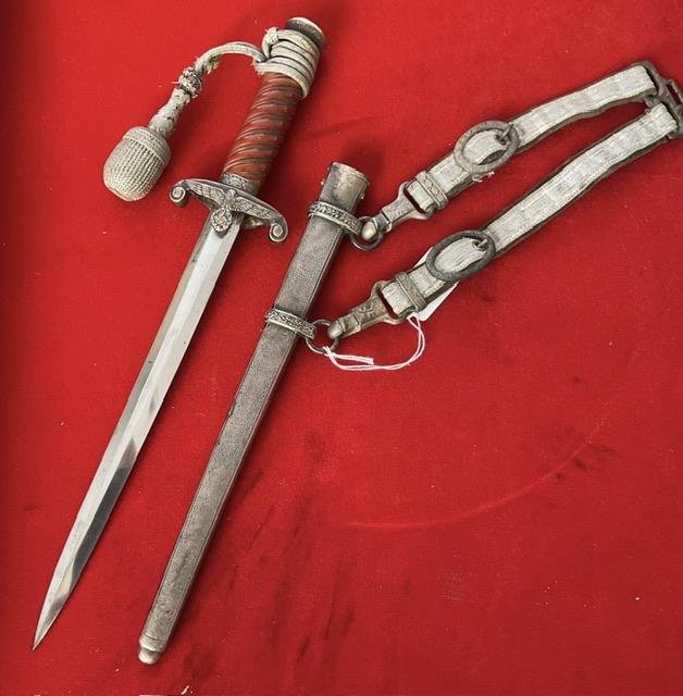 Full rig WKC army dagger with slant grip.