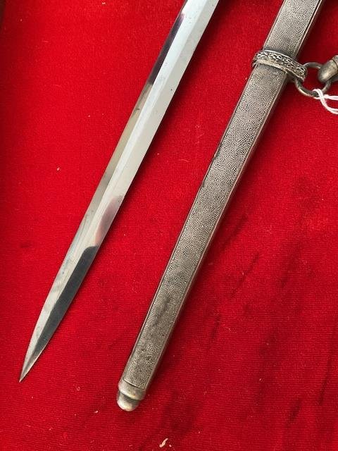 Full rig WKC army dagger with slant grip.