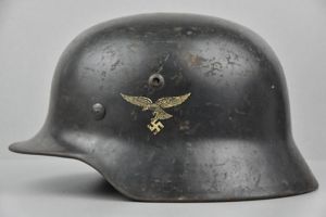 Early M35 Luftwaffe double decal steel helmet with droop tail eagle ET64 1938 unit marked