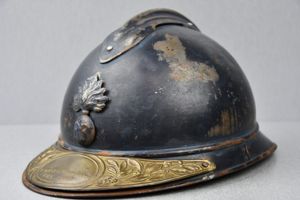 WW1 M1915 French Adrian helmet with brass with veteran plate