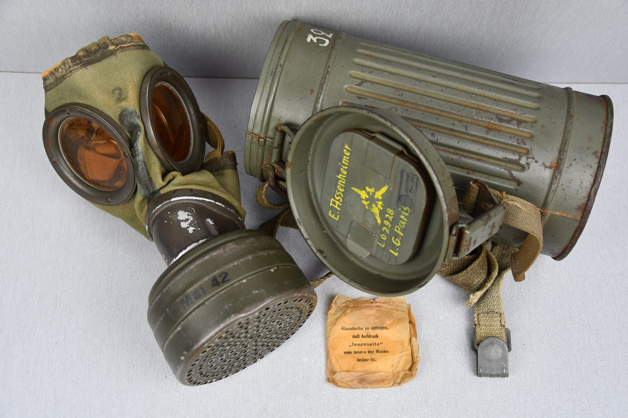 Early short M31 gas mask canister with straps and mask 1937 named and Luftwaffe unit marked L.G. Paris — image 2