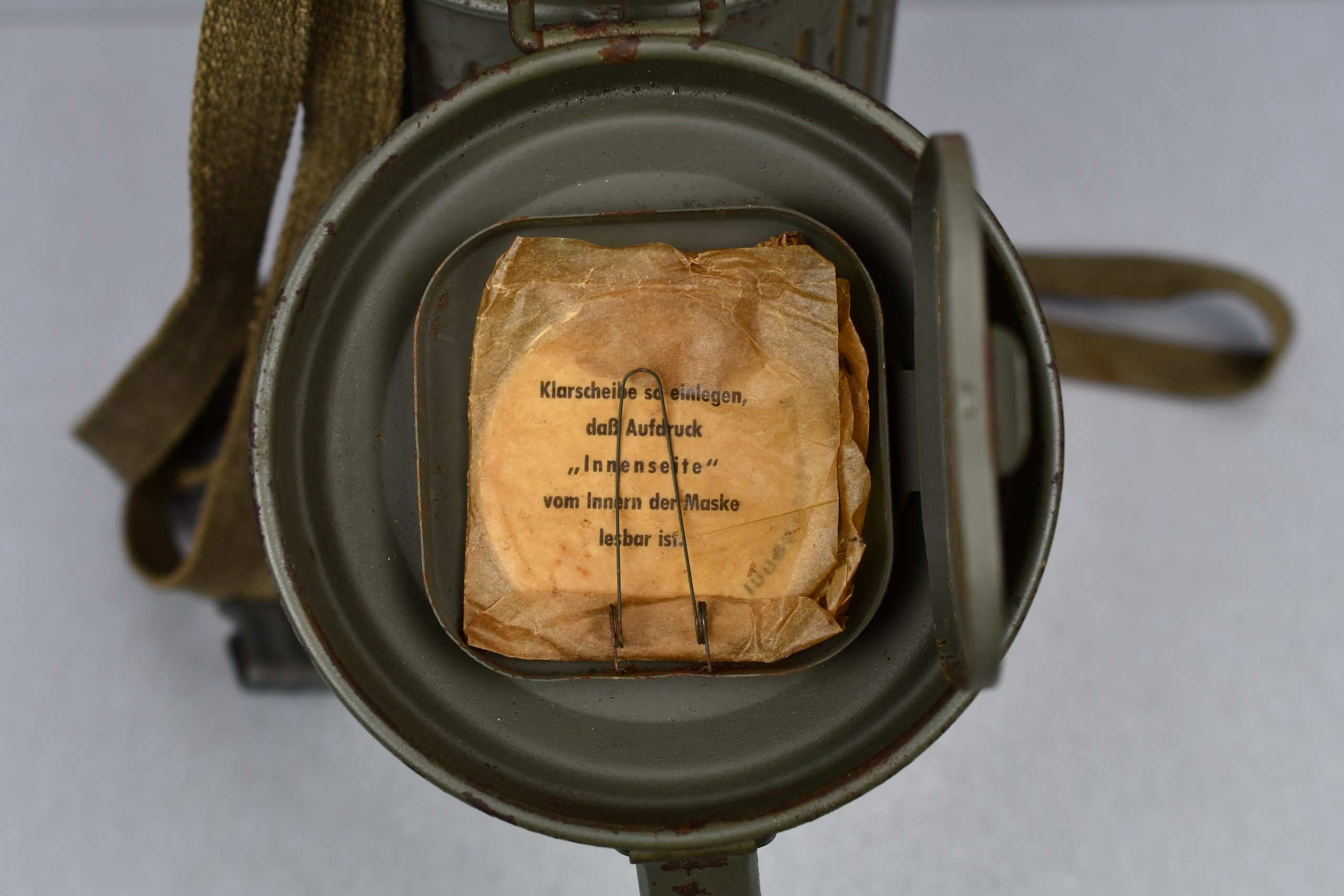 Early short M31 gas mask canister with straps and mask 1937 named and Luftwaffe unit marked L.G. Paris — image 26