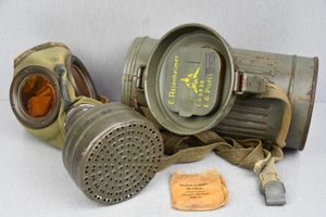 Early short M31 gas mask canister with straps and mask 1937 named and Luftwaffe unit marked L.G. Paris