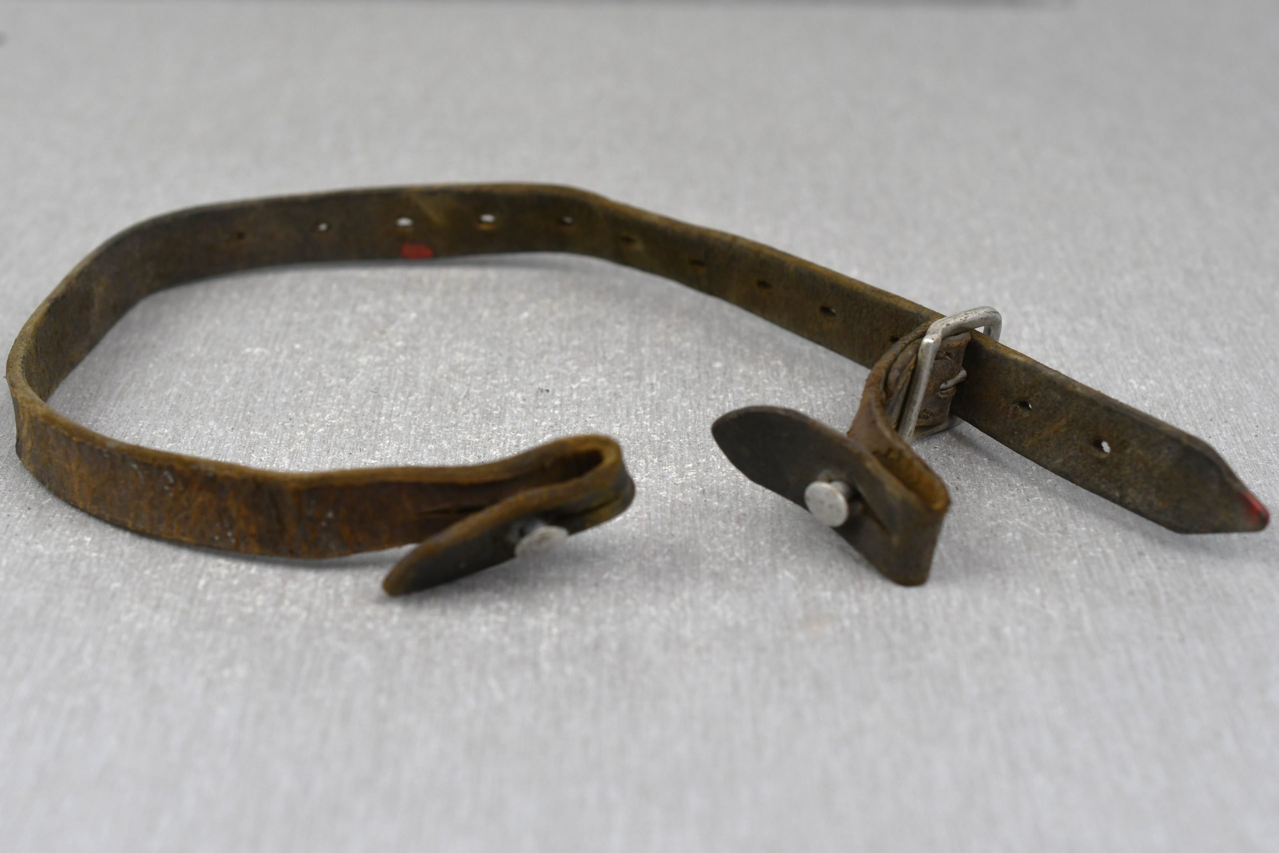 Early German helmet chin strap with aluminum buckle