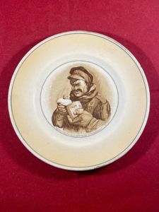 WW1 Bruce Bairnsfather 6' Commemorative Plate/Plaque Depicting 'Old Bill' and the words 'WHEN THE 'ELL IS IT GOIN' TO BE STRAWBERRY?'