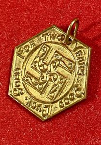 Pre WW2 Gilt Metal Swastika Token 'FOR TWO YEARS OF GOOD LUCK - GOOD LUCK' c1930