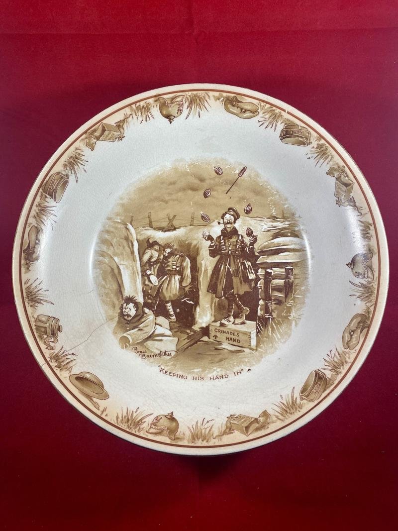 Large WW1 Bruce Bairnsfather 9' Commemorative Dish Depicting a Juggling Grenades Cartoon and the words 'KEEPING HIS HAND IN?'