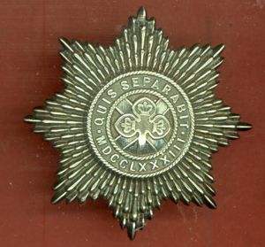 Irish. 4th Royal Irish Dragoon Guards Victorian HM silver NCO's arm badge.