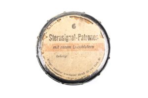 Bakelite flare container with red label