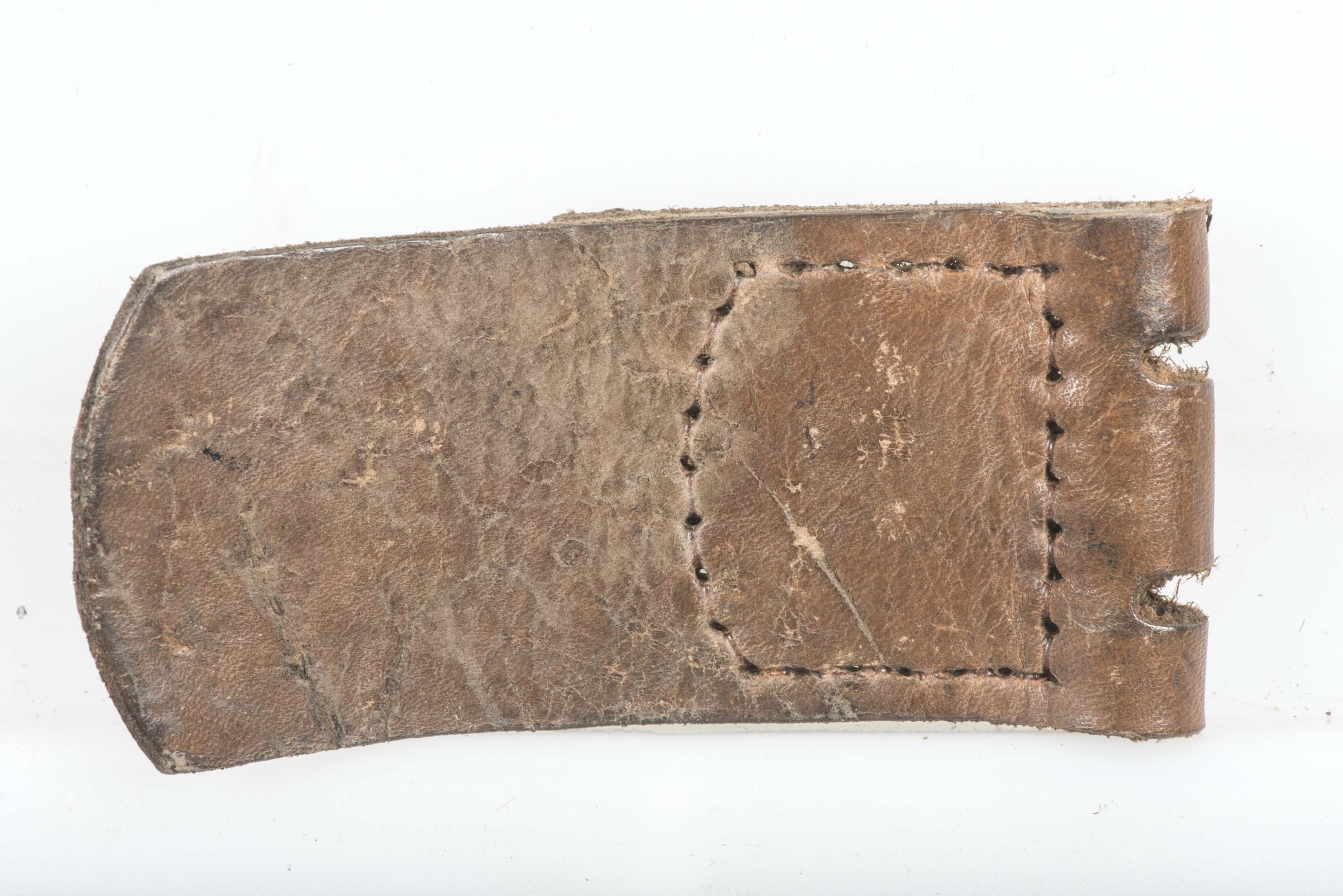 Leather belt buckle tab marked F.W. Assmann & Söhne, Lüdenscheid 1942