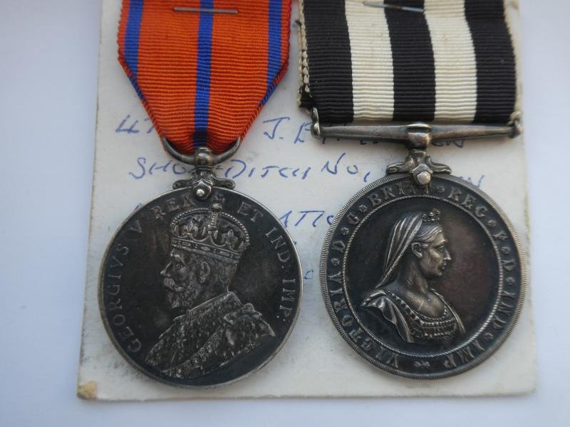 1911 CORONATION MEDAL ST JOHNS AMBULANCE ISSUE-AND MEDAL OF THE ORDER OF ST JOHN PAIR TO HIGGINSON-SHOREDITCH DIVISION