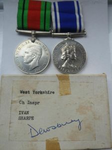 DEFENCE MEDAL AND POLICE EXEMPLARY SERVICE MEDAL TO CHIEF INSPECTOR IVAN SHARPE-WEST YORKSHIRE POLICE