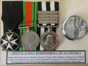 ST JOHN'S AMBULANCE BRIGADE GROUP OF THREE-TO HOLT HUDDERSFIELD DIVISION