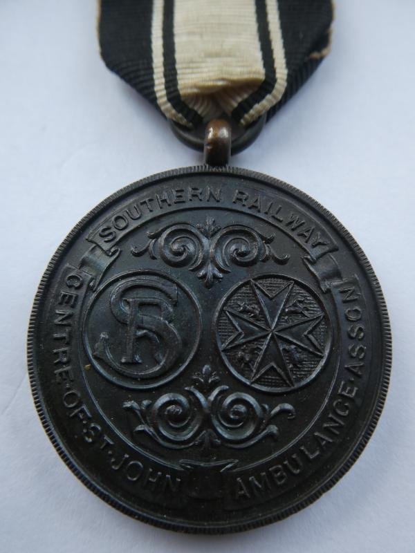 SOUTHERN RAILWAYS CENTRE OF ST.JOHN AMBULANCE ASSOCIATION BRONZE MEDAL WITH 7 YEARS CALSP-NAMED TO: KENNETH WALTON 1932