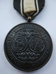 SOUTHERN RAILWAYS CENTRE OF ST.JOHN AMBULANCE ASSOCIATION BRONZE MEDAL WITH 7 YEARS CALSP-NAMED TO: KENNETH WALTON 1932
