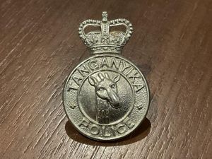 Post 1952 Tanganyika Police cap badge.
