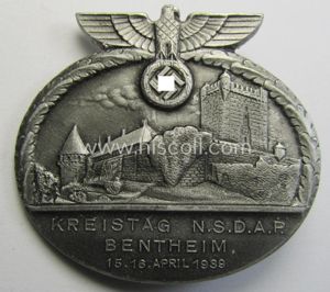 Commemorative, 'N.S.D.A.P.'-related 'tinnie' being a maker- (ie. 'Paulmann & Crone'-) marked example depicting an N.S.D.A.P.-party-eagle and towns'-view coupled with the text: 'Kreistag N.S.D.A.P. - Bentheim - 15./16. April 1939'