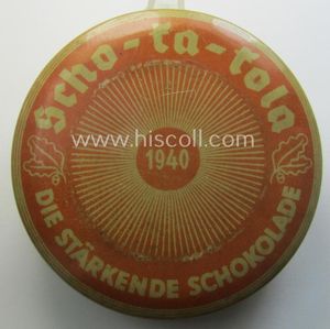 WH chocolate ration-tin of the make: 'Scho-ka-kola - Wehrmachts-Packung', dated: '1940' that comes in an overall nice, albeit clearly used- (ie. empty) condition