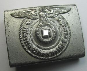 Waffen-SS, EM- (ie. NCO-) type belt-buckle (being a typical, unmarked and typical steel-based: 'Overhoff & Cie'-example) that comes in a surely issued- and/or moderately used- ie. worn, condition