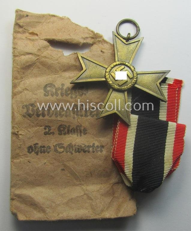 Fully matching medal-set: 'KvK 2. Klasse o. Schwn.' being a clearly maker- (ie. '36'-) marked specimen that comes in its (incomplete ie. relic) pouch by the 'Hersteller': 'Burg & Leonhard - Hanau a. M.'
