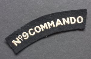 A superb - albeit regrettably single - typical British made Number 9 Commando shoulder title