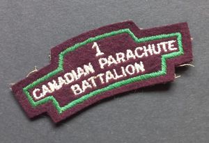 A attractive - late war British made - 1st Canadian Parachute Battalion shoulder title