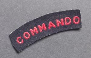 A superb - albeit regrettably single - early embroided Commando shoulder title