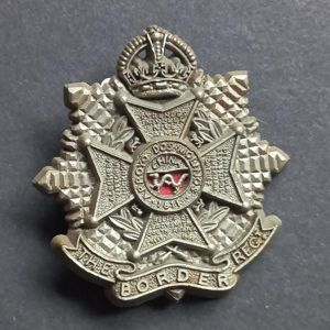 A attractive (now days not so easy to find) plastic i.e bakelite The Border Regiment cap badge