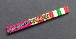 A attractive Polish medal ribbon bar with a 'Monte Cassino' clasp, a North Africa Star and a Italy Star medal ribbon