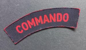 A attractive - albeit regrettably single - early printed Commando shoulder title