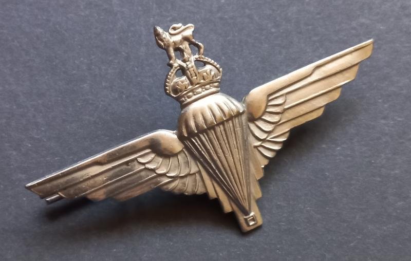 A nice uncommon - so called cut-out i.e voided crown - cap badge to the Parachute Regiment