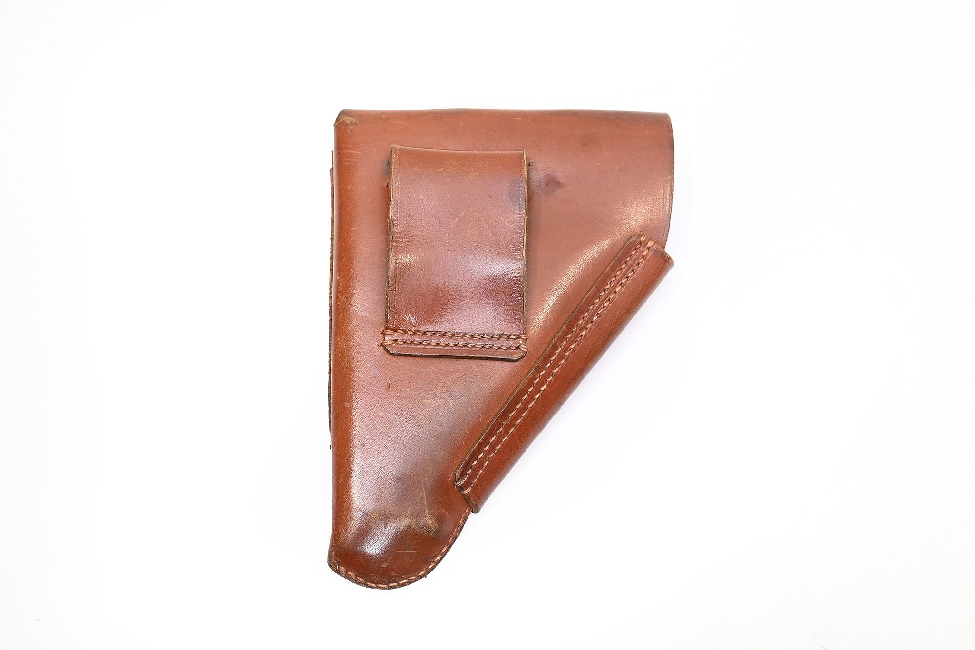 brown unmarked ppk holster.