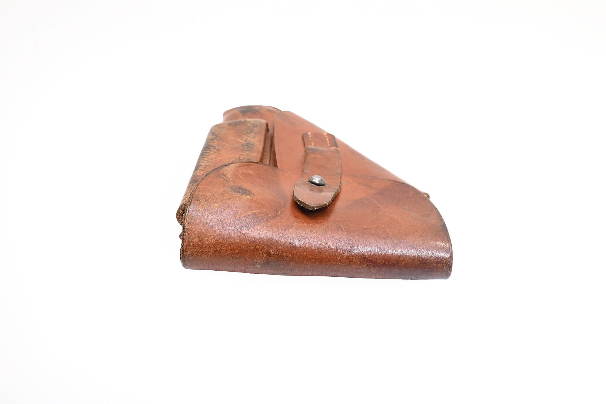 brown unmarked ppk holster.