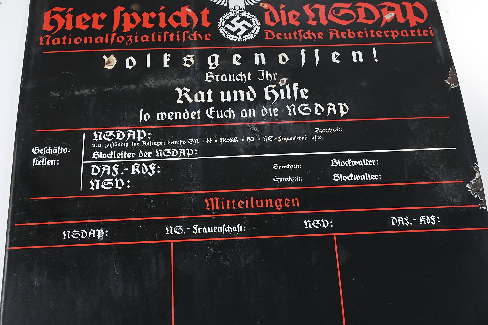 enamel sign here spricht die nsdap