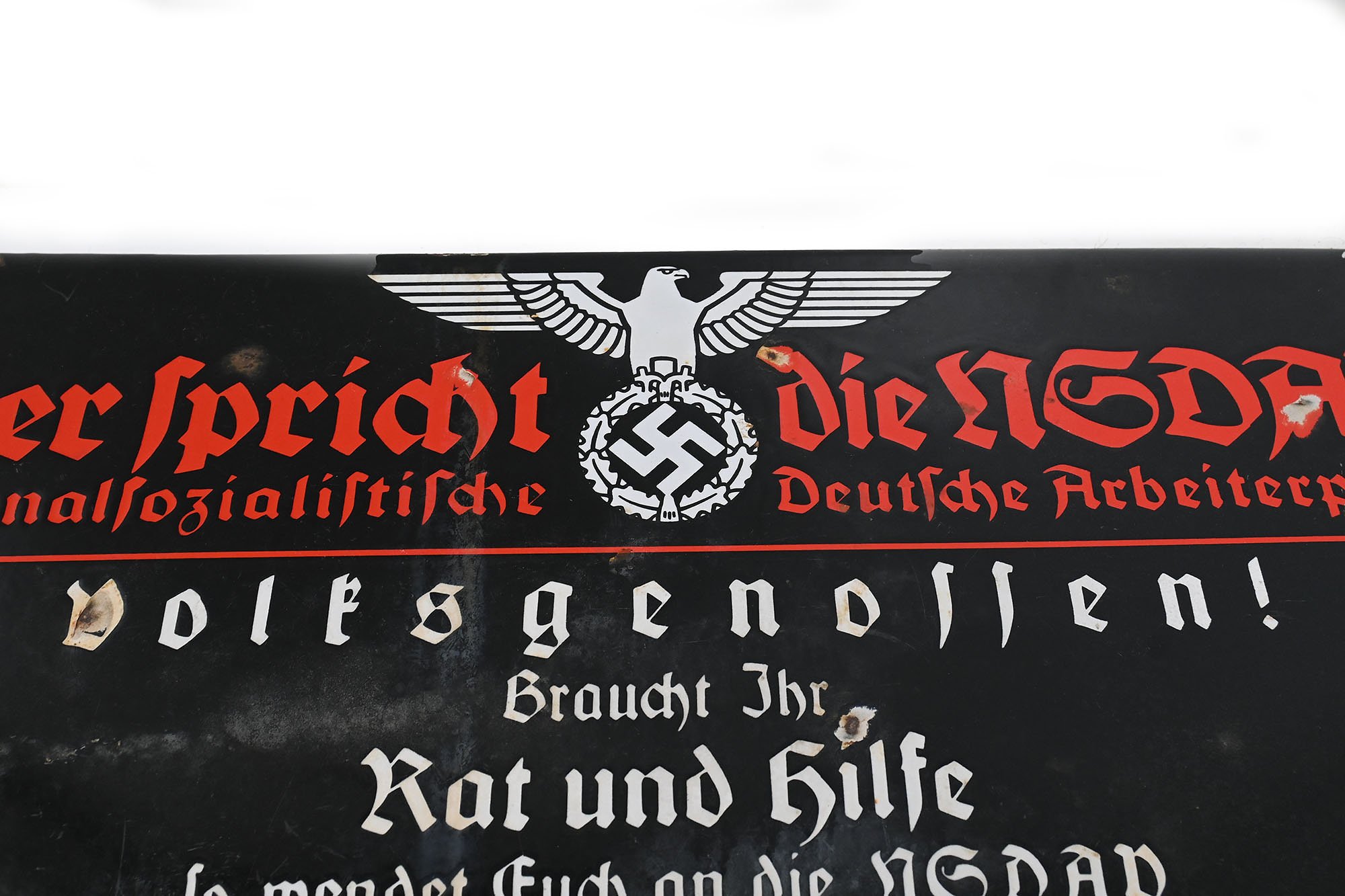 enamel sign here spricht die nsdap