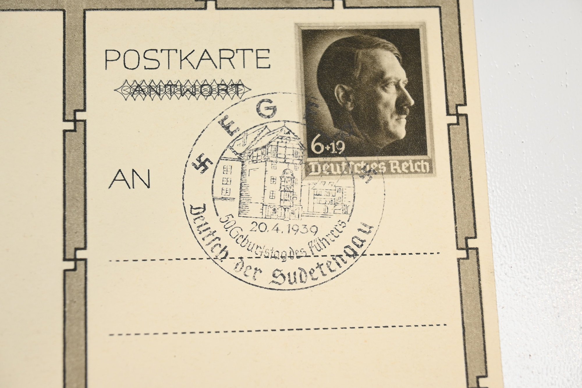 postcard featuring Hitler.