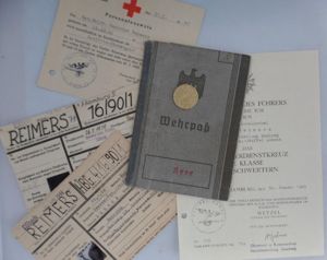 Wehrpaß / document grouping WH (Heer) - 'Armmegruppe Müller' - Reimers