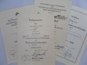 Award document grouping WH (Heer) - 8.Pz.Div. - Müller