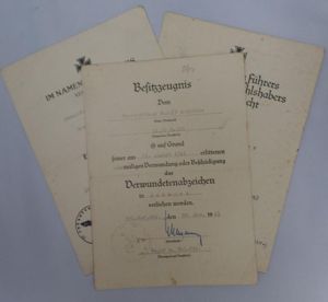 Award document grouping WH (Heer) - 11.Inf.Div.- Schröder