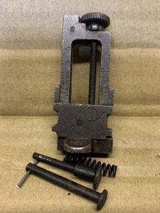 LEE ENFIELD No4 MK1 SINGER TYPE MILLED REAR SIGHT. GOOD WORKING ORDER WITH GOOD CLICKS . SCARCE SAVAGE MARKED. HAS NO OTHER MARKINGS.