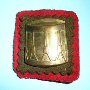 Brass Drummers Proficiency Trade Arm Badge on Backing Plate - Backing Cloth of Gosling Green indicating Royal Northumberland Fusiliers (RNF)