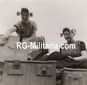 Original WW2 Dutch Liberation Press Photo - Dutch woman in traditional costume of Zeeland on a British tank (1945)