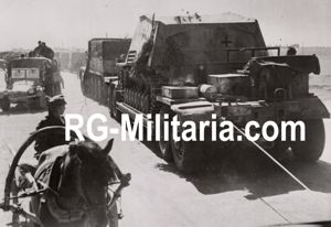 Original WW2 German Press Photo - German Panzer Tank Nashorn on a trailer, Eastern Front, July (1944)