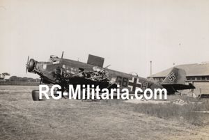 Original WW2 German Photo - Crashed Junkers JU 52 airplane with decal, airfield Ockenburg, The Hague (1940)