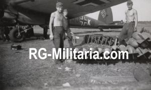 Original WW2 German Photo - Heinkel He 111 loading bombs at Fliegerhorst Schiphol, Amsterdam (1940)