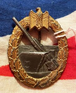 A Very Good Original, WW2, Kriegsmarine Coastal Artillery Combat Badge Kriegsabzeichen für die Marineartillerie By Friedrich Linden of Lüdenscheid. From One Of Ian Fleming's Naval Intelligence Section's So Called 'Red Indians' 30 Commando Special Engineer