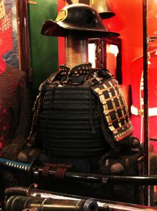 Suit Of Original Edo Period Samurai Horserider Armour, With a Bajojingasa 馬上陣笠 Kabuto, A Samurai Horse Rider Battle Helmet. With Gold Maruni Tsuta Kamon. The Maruni Tsuta (丸に蔦) Kamon, Meaning 'Japanese Ivy in a Ring'. Matsunaga Family Crest in Kakuda