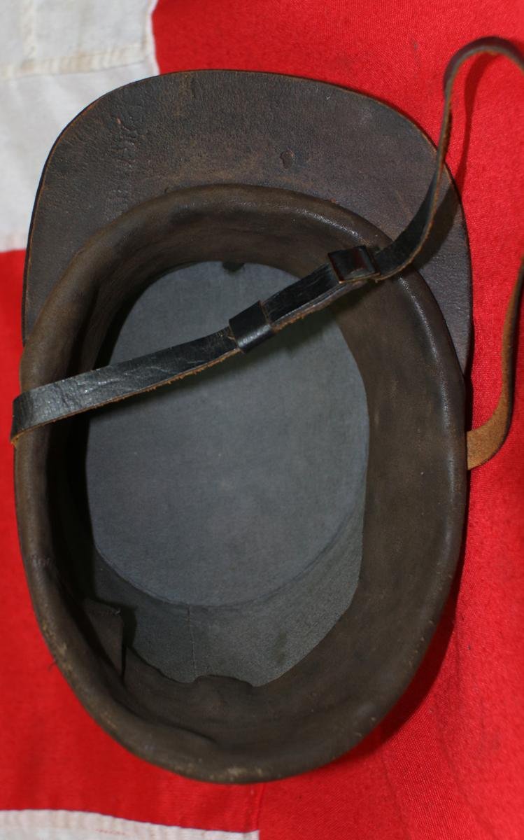 A Superb & Excellent Condition Mid Victorian Infantry Shako Service Cap, Pierced Centre, Double Crowned, With Lion Centre. General Service Shako Helmet Plate & And Rarely, Complete & Original, Leather Chin Strap