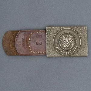 GRA62 Postschutz EM belt buckle with leather tab, maker B. Haarmann