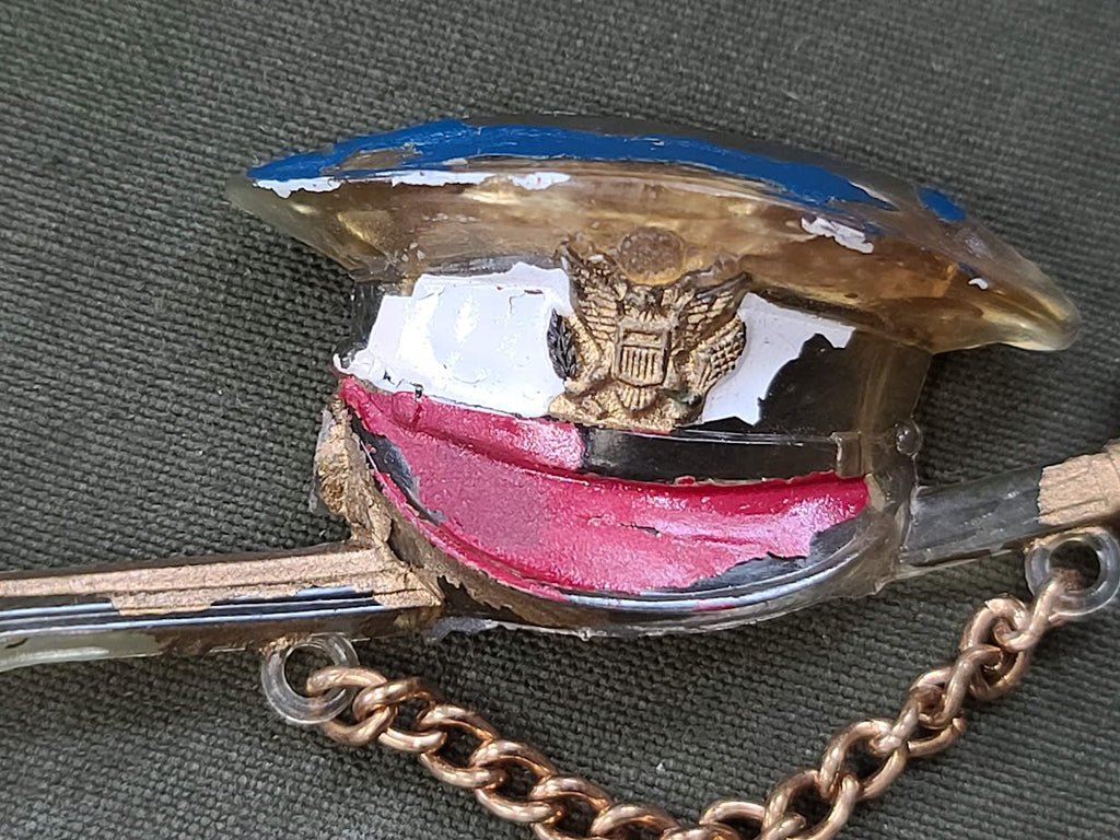 Early Plastic Hat and Sword Pin — image 2
